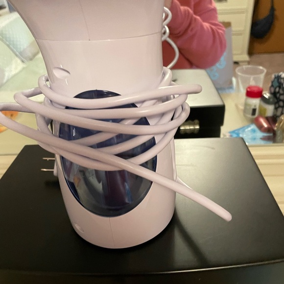 Like new garment steamer. Used once. hasbrush attachments. Distilled water rec. - Picture 2 of 4